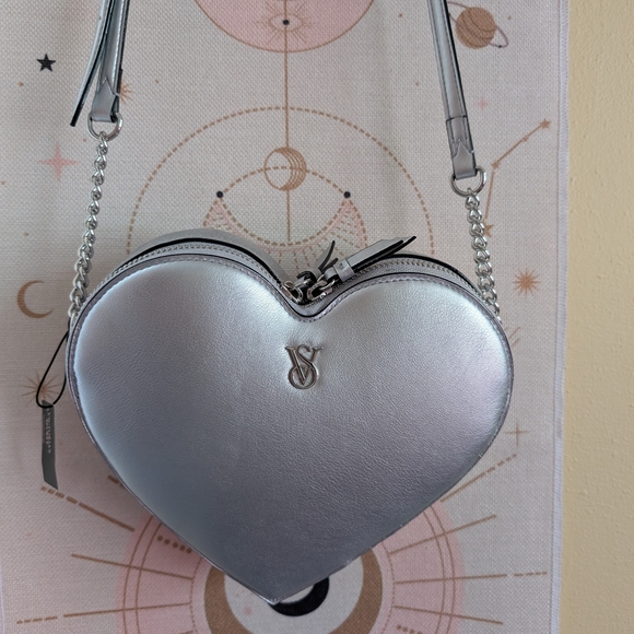 Victoria's Secret Handbags - Victoria's Secret Metallic Silver Heart Crossbody Bag